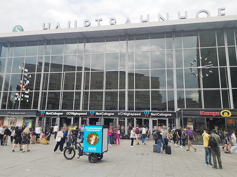 Bright advertising on our advertising bike at Cologne Central Station